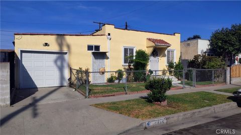 Photo of 8915 McKinley Ave, Los Angeles, CA 90002 (MLS # DW25218697) Photo of 8915 McKinley Ave, Los Angeles, CA 90002 (MLS # DW25218697)