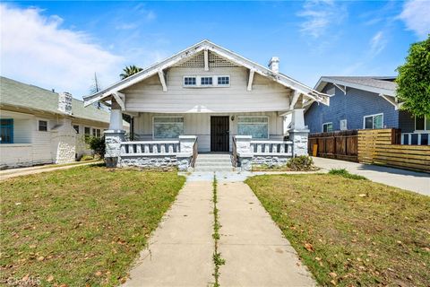 Photo of 1431 W 37th Drive, Los Angeles, CA 90018 (MLS # NS26093364)