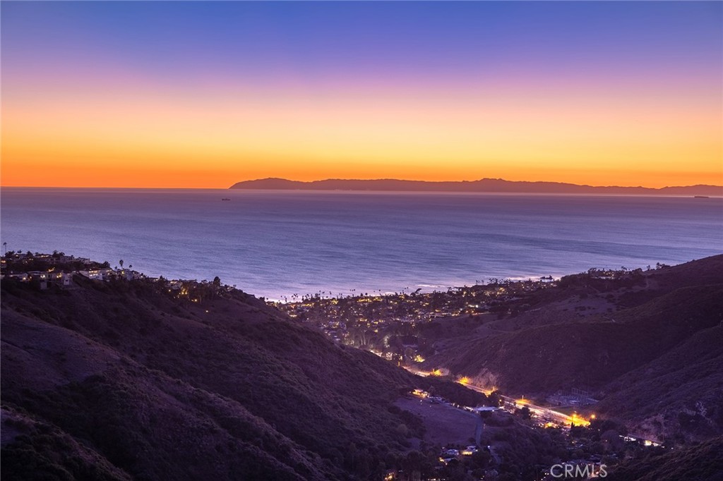 World” Adjacent|Modern Coastal Masterpiece|Ocean Views • Paid Solar • Rotating Living Room Platform!
Located in the first position adjacent to “Top of the World,” this one-of-a-kind 2015-built architectural estate captures jaw-dropping, panoramic ocean and coastline views from nearly every angle. Behind a private gate, this nearly 1/3-acre contemporary compound blends European elegance with cutting-edge sustainability and sleek modern design.
2,500 sq ft oceanview terrace + lower-level spa patio & outdoor kitchen – built for indoor-outdoor California living
Incredible rotating living room floor that turns to reveal either a 124-inch theater screen or breathtaking views
Designer chef’s kitchen with premium Miele appliances & rich walnut cabinetry
Luxurious primary suite with open-air shower, ceiling-fill soaking tub & dual walk-in closets
Fully self-contained guest casita (ADU) perfect for extended family, guests, or rental income
Paid-off solar system, oversized 3-car garage, motor court, and smart home technology
Steps from nature preserve trails, award-winning schools, tennis & pickeball, and downtown Laguna Beach
This is more than a home—it’s a private sanctuary in the sky. Experience true coastal luxury living in one of Laguna Beach’s most iconic locations.https://apply.link/rRSi3io