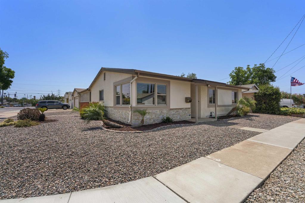 Pride of ownership abounds! This terrific corner lot home is located close to Mount Etna Park, great schools, shopping & the beaches. One of the few Mt St floor plans w/ a large covered patio area in between the house & detached garage. The home features a gorgeous remodeled kitchen w/ recessed lighting, high end cabinets & solid surface counter tops. Among the many features are laminate wood flooring, new carpet, fresh paint, an upgraded furnace w/ AC, electrical panel, vinyl windows & a slider that leads out to the covered patio area, full 2 car garage & the well landscaped, low maintenance backyard. There's even a shed for extra storage. Welcome home!