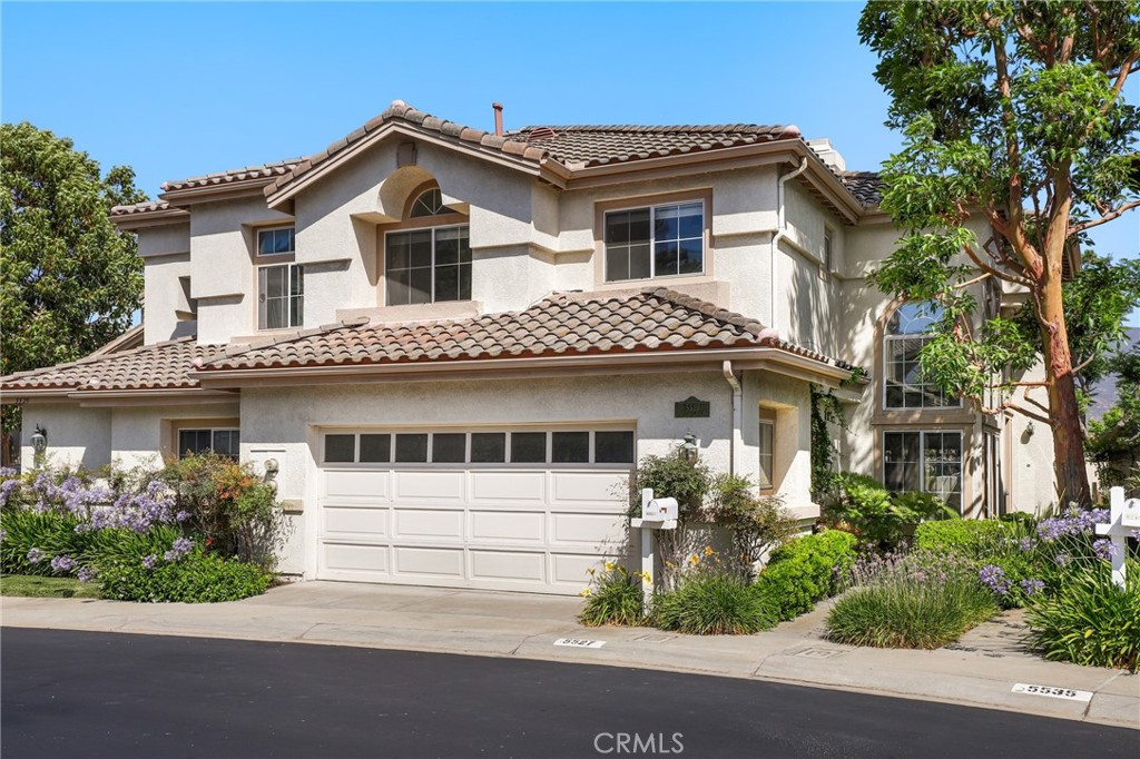 Welcome to 5527 Patricia Way, an elegantly updated home in the sought-after La Terraza community of Yorba Linda. Brimming with natural light, this residence showcases soaring vaulted ceilings, an open-concept flow, and thoughtfully placed windows that create a bright, inviting atmosphere. The formal living and dining rooms provide a stylish backdrop for entertaining, while the cozy family room—with fireplace and direct access to a private covered patio—offers everyday comfort and mountain-view serenity.
The remodeled kitchen is appointed with granite countertops, stainless steel appliances, and a reverse osmosis water filter, seamlessly connecting to the breakfast nook and family room. Downstairs also features a guest powder room, full-size laundry room, and direct access to the two-car garage.
Upstairs, the spacious primary suite is a peaceful retreat with vaulted ceilings, mountain views, and a spa-inspired bath with dual vanities, soaking tub, separate shower, and a walk-in closet. Two additional bedrooms and a full bath with dual sinks complete the upper level.
Notable upgrades include genuine hardwood flooring, updated stair railings and lighting, all-new plumbing, a brand-new HVAC system, Halo 5 whole-home water filtration and conditioning, and custom top-down bottom-up window treatments.
La Terraza residents enjoy resort-style amenities including two pools, two spas, and a sport court for tennis, pickleball, and basketball, plus direct access to trails, Bryant Ranch Park, and top-rated Yorba Linda schools. This home blends comfort, style, and community living—truly a must-see!