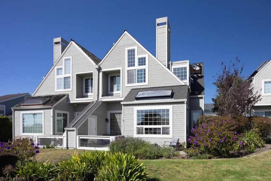 Nothing to do here except move in!  An absolutely show-stopping remodel top to bottom!  Walls of windows showcase sweeping views of the first fairway and green of the Ocean Colony Golf Links. Special touches and attention to detail throughout this elegant 3BR home put it in a class by itself! High ceilings throughout, skylights, and south facing windows bring the outside in. The kitchen alone, is a testament to the designer and builder, Kate Handel & Brian Bodas. Every element appears thoughtfully chosen and intentionally placed. The island is so grand there's room to seat the entire family, or perfect for entertaining.  The family room is anchored by a wall of beautiful stone, constructed to frame the fireplace and flatscreen TV. The primary suite on the upper level enjoys beautiful golf course views, and the bath with an elegant soaking tub, and marble vanity has a hidden dryer to warm your towels!  So many special touches like the built-in-desk in the family room, the perfect place to read, in the sun room, and the office off the guest room, make this home truly one of a kind! Stroll down to the Ritz at sunset to listen to the bagpiper. This one checks every box, including an electrical hookup for a generator.  It's modern, but it's cozy with a very cool coastal vibe.