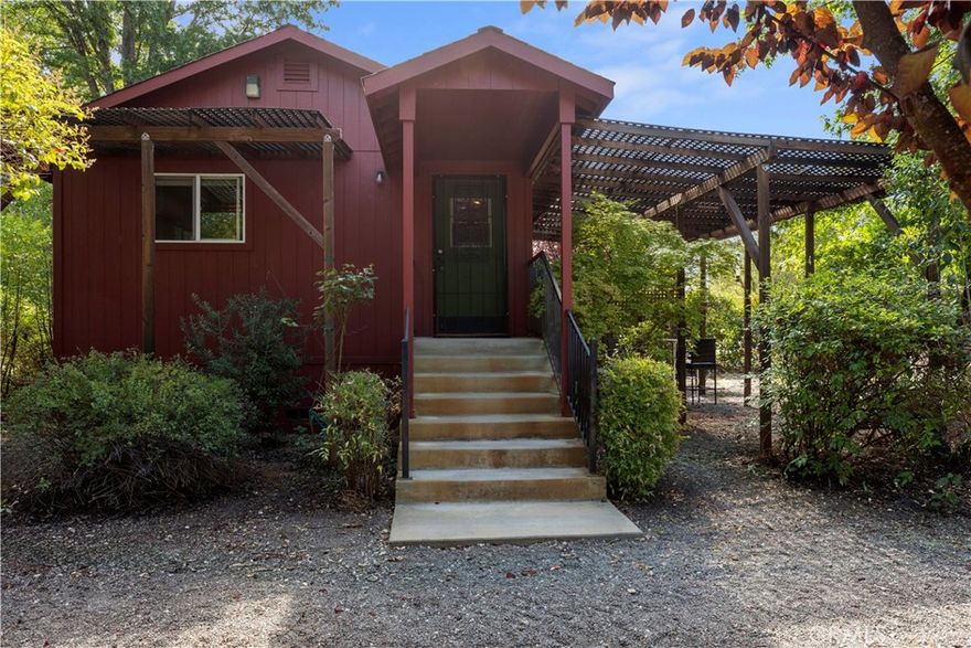 Tucked away on over 6.7 acres of scenic, usable land, this thoughtfully designed 2-bedroom, 1-bath home is the perfect blend of privacy, comfort, and versatility. Built in 2014, the home is complemented by a spacious detached art studio approx. 600 sq ft ideal for creativity, a home office, or guest quarters. The property features a high-producing well equipped with a brand-new water softener and advanced filtration system, ensuring fresh, clean water throughout the home. Fully fenced and gated, there's ample room for gardening, livestock, vineyard potential. Enjoy easy access just off Highway 29, minutes from Lampson Field, local markets, shops, dining, and healthcare. Whether you're looking for a peaceful retreat, a hobby farm, or a place to grow, this property has endless possibilities. Surrounded by the natural beauty of Lake County, you're just under two hours from the ocean or major city life—and within comfortable distance to outdoor destinations like Lake Tahoe and Reno. A rare opportunity to live, create, and thrive in Northern California’s countryside.