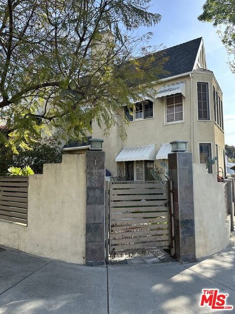 Photo of 1086 Meadowbrook Avenue, Los Angeles, CA 90019 (MLS # 26635445)