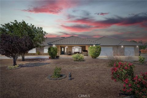 Photo of 7330 Smoke Tree Road, Phelan, CA 92371 (MLS # TR25243650)