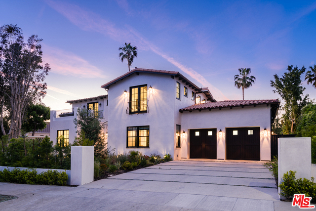 Entertainer's dream home! Brand new construction in Hancock Park w/ the finest finishes. Impressive Spanish-Contemporary sits on a private cul-de-sac & overlooks the renowned Wilshire Country Club golf course. This home has an open & light filled floorplan w/ 6 beds & 7 baths. Grandiose living spaces include a tasteful parlor room w/ custom built bar, marble fireplace, & butler's pantry. A professional grade chef's kitchen features an oversized Carrara marble island & Wolf & Miele appliances.Automated Fleetwood walls of glass flow to a large grassy backyard, a sun-drenched infinity pool & built-in bbq. Step upstairs & see four ensuite bedrooms, two w/ private terraces, & a spacious master suite w/ his & her showroom closets. The bathroom features a large marble encased shower & deep soaking tub. Take in the beautiful views of the golf course through the French doors of the private terrace. Move downstairs to your private cinema w/ oversized couches, or to the office next door.