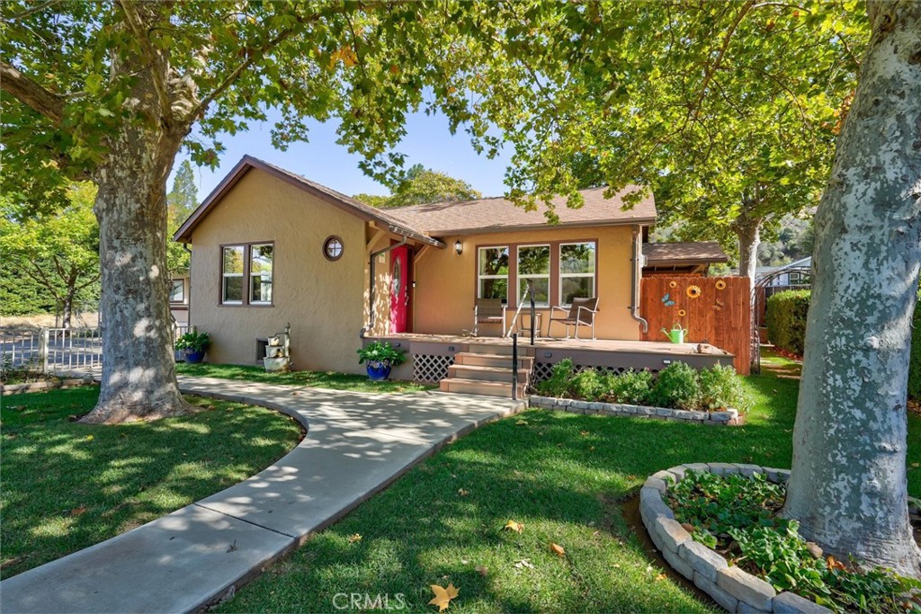 Discover this incredible income-producing property just steps from charming downtown Mariposa! The main home is a beautifully maintained 2-bedroom, 1-bath retreat currently operating as a thriving Airbnb. Guests love the home’s inviting layout, thoughtful updates, and manicured front and back yards that offer the perfect place to relax and take in the mountain air.
On the same property sits a spacious 2-bedroom, 2-bath mobile home, currently serving as a long-term rental for steady income. Adding even more versatility, the converted garage includes an additional room and attached bathroom—ideal for guest space, a studio, or private office.
With multiple income streams, prime location, and well-cared-for outdoor spaces, this property truly is an investor’s dream in the heart of Mariposa that won’t last long!