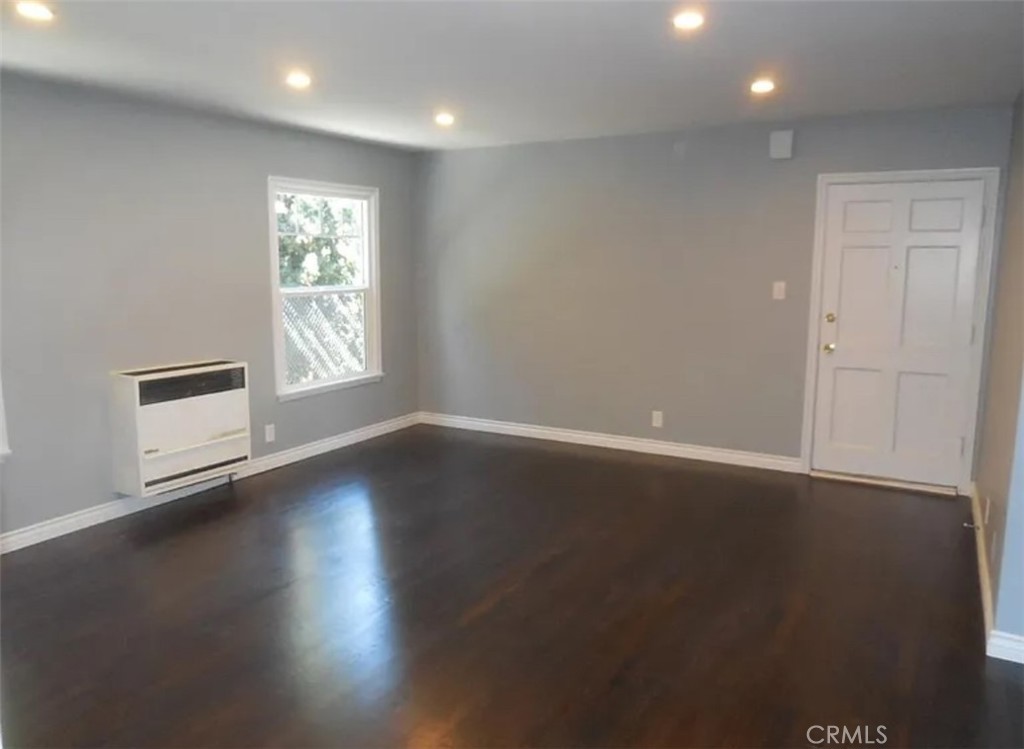 These are the before pictures! Now imagine your completely remodeled spacious downstairs unit which offers an abundance of natural light, new light-colored floors, granite countertops recessed lighting, ceiling fans, and parking. The galley kitchen offers granite countertops and is complete with new white cabinets, new stove and new refrigerator. The separate dining area is perfect for your next dinner party. Both bedrooms are nice sizes to hold all of your furniture. The linen closet shelves are plentiful and deep. The bathroom offers a shower & tub combo which is perfect if you’re on the go or need a hot bubble bath to relax and unwind after a long day. The bathroom floor is now lighter with a new vanity. Street parking? Not for you! 2 assigned tandem spaces await in the complex driveway. However, street parking is plentiful and will not be an issue for your guests. We accept your furry family members with a smile. Breed and weight restrictions apply. Convenient to parks, gas stations, grocery stores, coffee shops, the 110 freeway, art galleries, downtown and the Dodger stadium. Start packing! Welcome home!