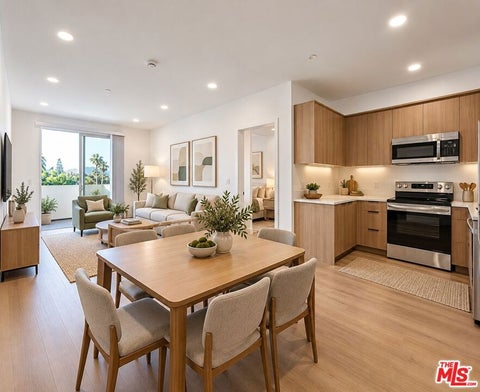 Photo of 14811 Erwin Street #407, Van Nuys, CA 91411 (MLS # 26101967)