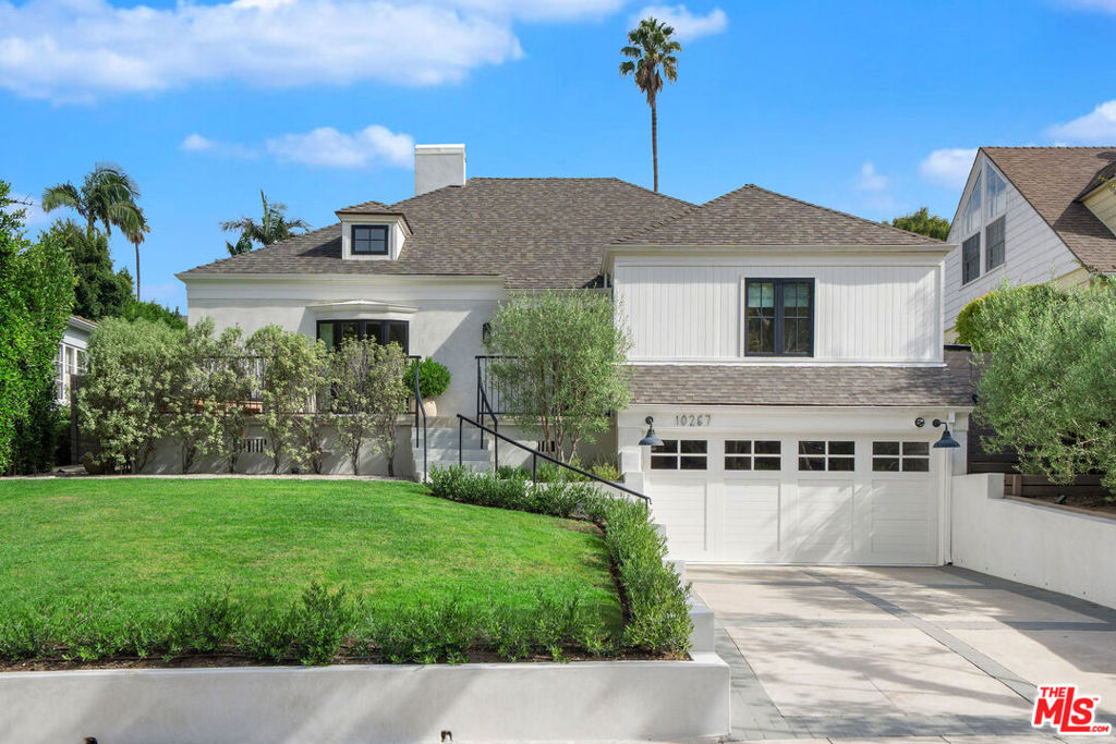 Situated on a beautiful tree-lined street in prime Cheviot Hills, this three bedroom, four bathroom designer-done home is the one you have been waiting for. The meticulous attention to detail combined with its style and sophistication make this recently remodeled residence a truly special property. The front entry leads to a large light-filled living room, complete with a double-sided fireplace, which flows perfectly into the elegant dining room. The chef's dream kitchen features a huge center island with seating for at least six people, custom cabinetry and floating shelves, quartzite countertops, farmhouse sink, spacious pantry, and top-of-the-line stainless steel Thermador appliances including a double oven, six-burner gas cooktop, built-in refrigerator/freezer, and double beverage refrigerator. The large breakfast area in the kitchen is ideal for everyday casual dining, yet spacious enough to host a large gathering with family and friends. Off of the kitchen, the family room's LaCantina bifold doors open completely from wall to wall and welcome you and your guests to an entertainer's dream backyard, highlighted by a spacious patio, covered pergola, maintenance-free turf, art studio, and an incredible pool and spa. The primary bedroom suite is the perfect space to relax and unwind and its spa-like ensuite bathroom with dual sinks, custom vanity, and oversized shower finishes the elegant space. Two generous-sized guest bedrooms, office, laundry room, and finished garage with wood floors and a sauna complete this remarkable home. Perfectly located in the heart of Cheviot Hills near Fox Studios, the Griffin Club, Rancho Park golf course, and world-class shopping and dining at Westfield Century City. A truly special offering, rarely does a fully remodeled and move-in ready home become available in this neighborhood.