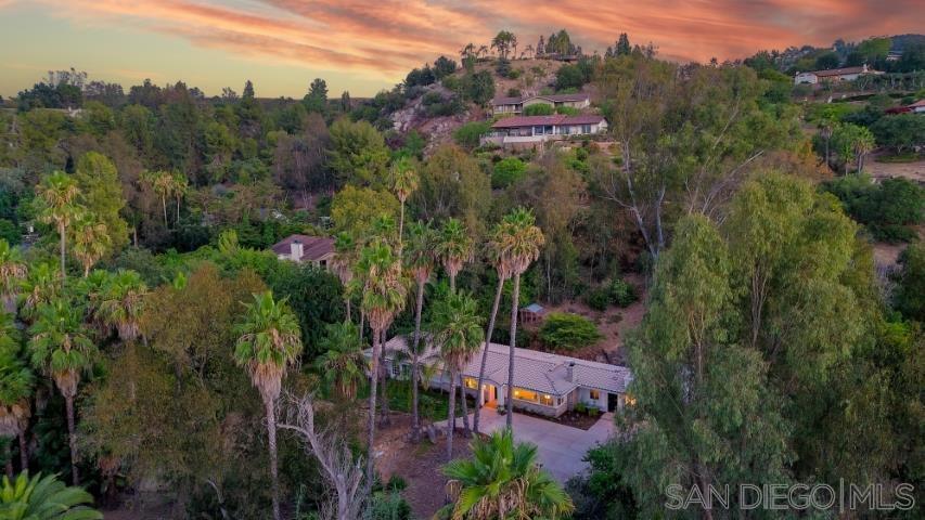 Discover refined living at 13311 Fallen Leaf Road, a single-story estate on 1.23 acres offering 4 bedrooms and 3 full bathrooms in one of Poway’s most sought-after enclaves. Privately set on a long drive and surrounded by lush mature landscaping, this home has been fully renovated to the highest standards. The expansive, open-concept interior blends timeless style with modern amenities, where walls of glass open to curated outdoor living spaces. Entertain in style with a sparkling pool, sun-drenched patios, and tranquil gardens, or retreat to your primary suite with a spa-like bath and peaceful views. With its rare combination of privacy, luxury, and access to the award-winning Poway Unified School District, this residence is more than a home—it’s a lifestyle.