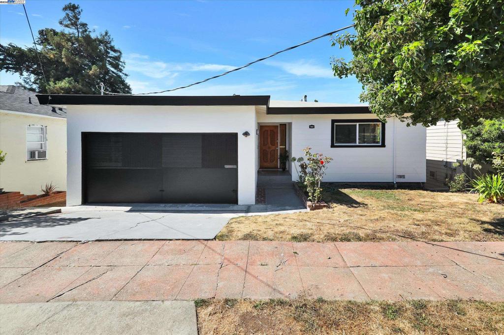 Welcome to 1551 Merced Street, a beautifully renovated home where modern updates meet timeless charm. With 3 bedrooms and 2 bathrooms, this residence offers a flexible floor plan designed to fit today’s lifestyle. The main level includes 2 bedrooms and a full bath, while the lower level features an additional living area with a bedroom and bath—ideal for multi-generational living, a private guest suite, or potential rental income. Refinished hardwood floors add warmth and character, while abundant natural light fills the spacious interiors. The bright living room frames sweeping Bay views, providing a stunning backdrop for both everyday living and entertaining. A large backyard invites gatherings, gardening, or peaceful relaxation, and the 2-car garage offers convenience along with a quiet location just moments from I-80. This move-in ready home blends space, flexibility, and views into one inviting package.