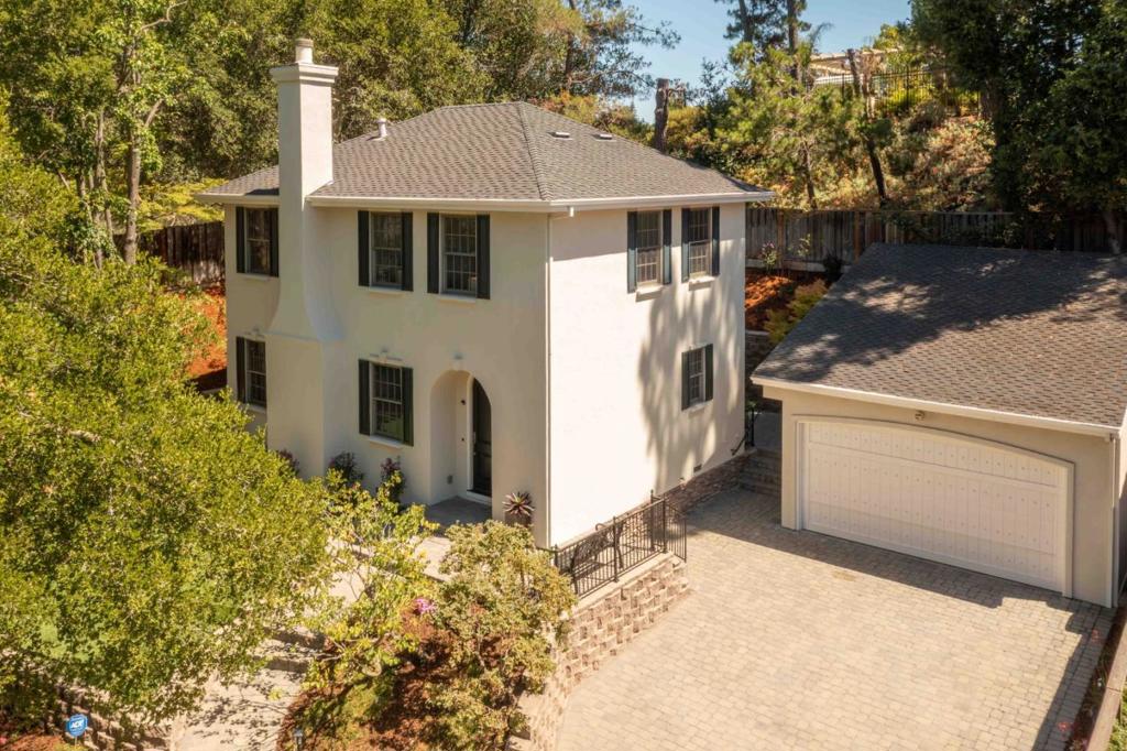 Set near the end of a secluded, tree-lined cul-de-sac, this welcoming home is surrounded by lush landscaping, with a graceful stone staircase leading to the front door. Sunlight fills the two-level layout, where hardwood floors, arched entryways, and crown molding add timeless appeal. The living rooms fireplace offers a comfortable gathering spot, while the dining room opens to the back patio for seamless indoor/outdoor meals, and the chef-quality kitchen features premium appliances from brands like Thermador and GE Monogram. Upstairs are three spacious bedrooms, including the primary suite with a jetted tub and shower. Outdoor enjoyment awaits on the large backyard patio and expansive front lawn, and the home also includes air conditioning, a 2-car garage, and extended driveway parking. Moments from the Rancho Shopping Center, Los Altos Golf and Country Club, nature preserves, and top-rated schools Loyola Elementary, Blach Intermediate, and Mountain View High (buyer to verify).