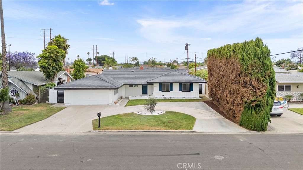 Welcome to 8771 La Grand Ave, Garden Grove, A Modern Oasis in a Prime Location. Nestled on a generous 8,800 sq ft lot in a peaceful, highly desirable neighborhood, this stunningly renovated single-story home offers the perfect blend of style, comfort, and function. Ideally located next to a serene Buddhist temple, this 1,500 sq ft residence is a true sanctuary in the heart of Garden Grove. Step inside to discover a bright, open-concept layout enhanced by recessed lighting and modern finishes throughout. Every detail has been thoughtfully curated, from the fully remodeled bedrooms and elegant tile bathrooms to the sleek marble countertops. The chef’s kitchen boasts stainless steel appliances and contemporary design, perfect for both everyday living and entertaining. The spacious master suite features a luxurious walk-in closet, offering comfort and privacy. Outside, your private retreat awaits with a sparkling pool, a dedicated outdoor bathroom, and ample space for entertaining or even an ADU. The expansive backyard is both inviting and versatile. A circular driveway, two-car garage, and plentiful parking enhance both convenience and curb appeal. Major upgrades, including updated plumbing and electrical systems, provide peace of mind for years to come. Whether you're hosting vibrant gatherings or enjoying tranquil evenings by the pool, 8771 La Grand Ave is more than a home. It's your personal Garden Grove escape. Schedule your private tour today and experience the exceptional lifestyle this home offers.
