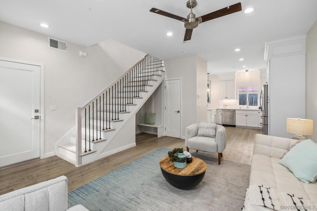 VA Approved and the best value in 91932! This Craftsman-style townhome, built in 2022 and just 5 minutes from the beach, features premium finishes and designer touches throughout. Enjoy a private, low-maintenance patio plus a second-floor tanning balcony—perfect for indoor-outdoor living. The oversized 2-car attached garage includes an EV outlet and plenty of storage. Inside, the open-concept layout boasts high ceilings, durable vinyl wood-look flooring, and a spacious primary suite with walk-in closet and en-suite bath, located near a full-size laundry room with side-by-side washer and dryer. Additional upgrades include a Wi-Fi-enabled HVAC thermostat, energy-efficient tankless water heater, and a solar-ready setup so buyers can choose their own provider and potentially benefit from tax incentives. Don’t miss the 3D Matterport tour and marketing video in the Virtual Tour link—this one won’t last! Who would have thought that so much was available at such a low price and only a 9 min bike ride to the water?! The Craftsmen style design fits perfectly into our Southern California landscape. This 8-unit complex was completed in 2022, making it newer construction. Exceptional attention has been paid to all of the details that make daily living effortless and inspiring. The windows are by the highly regarded manufacturer Milgard and allow for an abundance of natural light, creating a bright and inviting atmosphere. Upon entry you feel the contemporary flair, from the wide-plank, oak engineered wood floors, to the high ceilings and custom finishes. The kitchen is a dream unto itself, as it features a full suite of Frigidaire stainless-steel appliances and an abundance of cabinetry and food prep quartz counter space, complete with breakfast bar. The bedrooms are all generously sized with the primary suite being exceptional, featuring a large walk-in closet and dual sink primary bath with large walk-in shower. You will love the separate laundry room, located on the same level as the bedrooms, with its side-by-side Whirlpool washer and dryer, overhead cabinetry and wonderful window for additional ventilation and light.