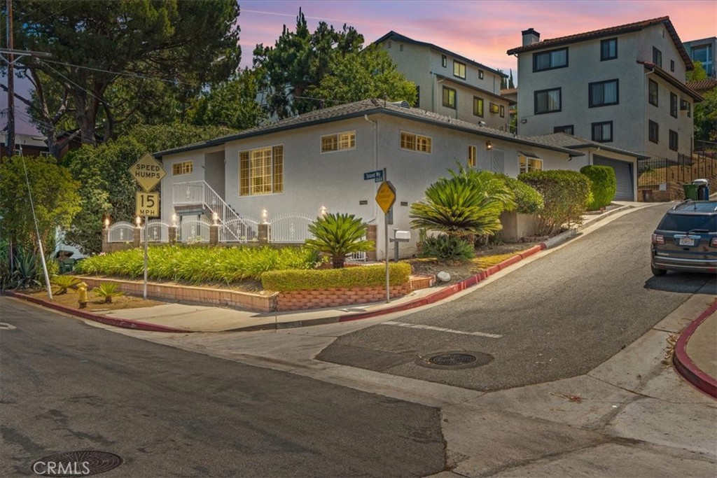 A developer’s opportunity or owner user who wants to bring their dream home to life. Featuring a unique and inviting corner lot home nestled in Eagle Rock neighborhood border to Glassell Park. This contemporary style home currently features 3 spacious bedrooms 1.5 Bathrooms, formal living room with large window offering great views and breeze into the home, separate dining room with a gas starter fireplace, an additional bonus room and separate laundry room. Dual pane windows, plantation shutters, multiple ceiling fans, central heating. Detached garage, great potential for an Accessory Dwelling Unit ADU opportunity plus a covered patio to entertain in backyard. The property offers great opportunity for a transformation with endless possibilities. Easy access to major freeways, restaurants, trendy shops and local favorites. This home is also conveniently located near Occidental College and Highland Park. Commuting and exploring all that Los Angeles has to offer and so much more. This is your opportunity to bring your dream home to life in one of Southern's California's most thriving neighborhoods. Schedule your tour today.