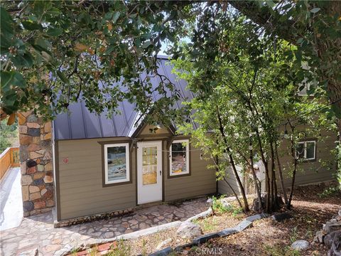 Photo of 177 Craghill Dr, Cedar Glen, CA 92321 (MLS # HD26070055)