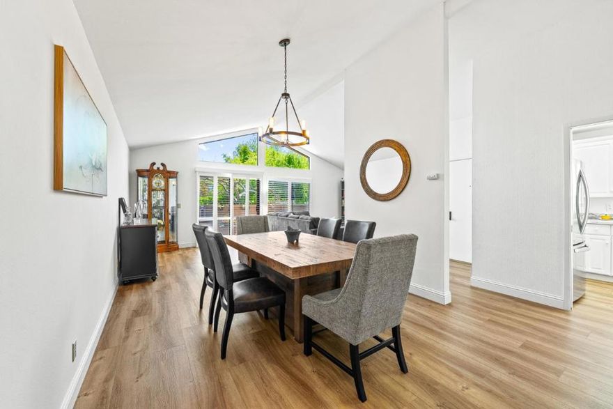 Only one of eight sought-after ground-floor units, a no-stairs end unit in the peaceful Arroyo Carmel community. This turnkey townhome is just steps from the Barnyard and Crossroads Shopping Centers and blends comfort and convenience with high ceilings, abundant natural light, and plantation shutters throughout. The living room with fireplace opens to a large private deck - ideal for relaxing or entertaining. The updated kitchen features quartz countertops, new appliances, and opens to a second sunny deck off the dining area. Enjoy casual meals in the breakfast nook or host in the elegant dining space with a stylishly updated wet bar featuring side-by-side wine refrigerators. The primary suite includes a renovated bath with double sinks, walk-in closet, and private retreat. A versatile additional room can serve as a third bedroom, home office, or den. Both bathrooms have been tastefully updated. Additional features include upgraded electrical, indoor laundry, instant triple filtered hot and cold water, whole home hot water heater circulator, and an attached 2-car garage with EV charger hookups. Community pool, clubhouse, sauna, and spa just steps away. Don't miss your chance on this rare single-level end unit!