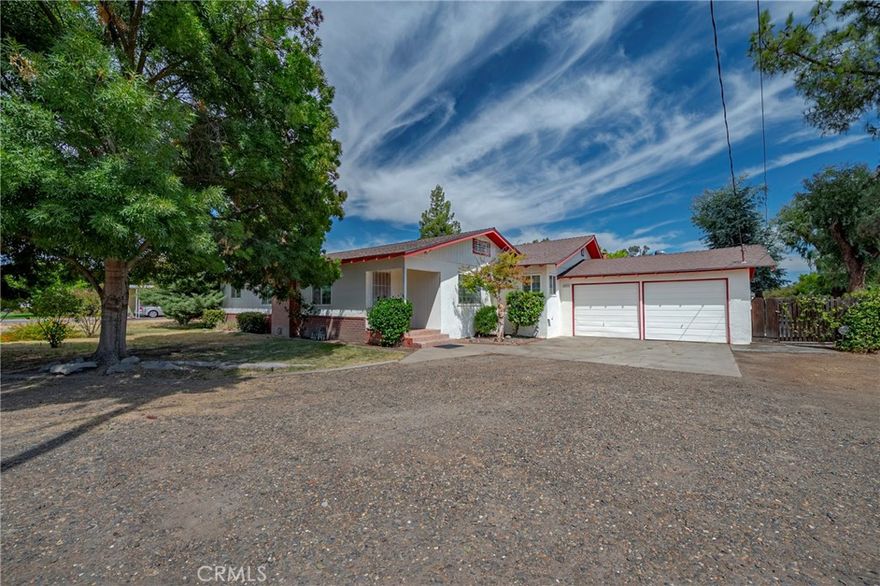 Enjoy the peace and space of country living without sacrificing convenience in this charming 3-bedroom, 2-bath home set on almost a full acre. With timeless original hardwood floors and dual-pane windows throughout, newer well put in approximately 3 years ago, newer roof, this well-maintained property offers the perfect blend of classic character and modern style with its open floor plan. Step into the inviting family room, where a cozy fireplace creates the perfect gathering spot. The kitchen features an electric range with hood, dishwasher and ample cabinet space-ready for home-cooked meals and entertaining. All bedrooms are comfortably sized, and both bathrooms are full, offering functionality for families or guests. Step outside to your personal oasis: an in-ground pool ideal for hot summer days, surrounded by plenty of yard space for gardening, outdoor dining, or expansion. There's even room for all your toys with RV parking! Whether you're looking to spread out, entertain or just enjoy the tranquility of rural life, this property is a rare find. Come see all the possibilities this home has to offer!