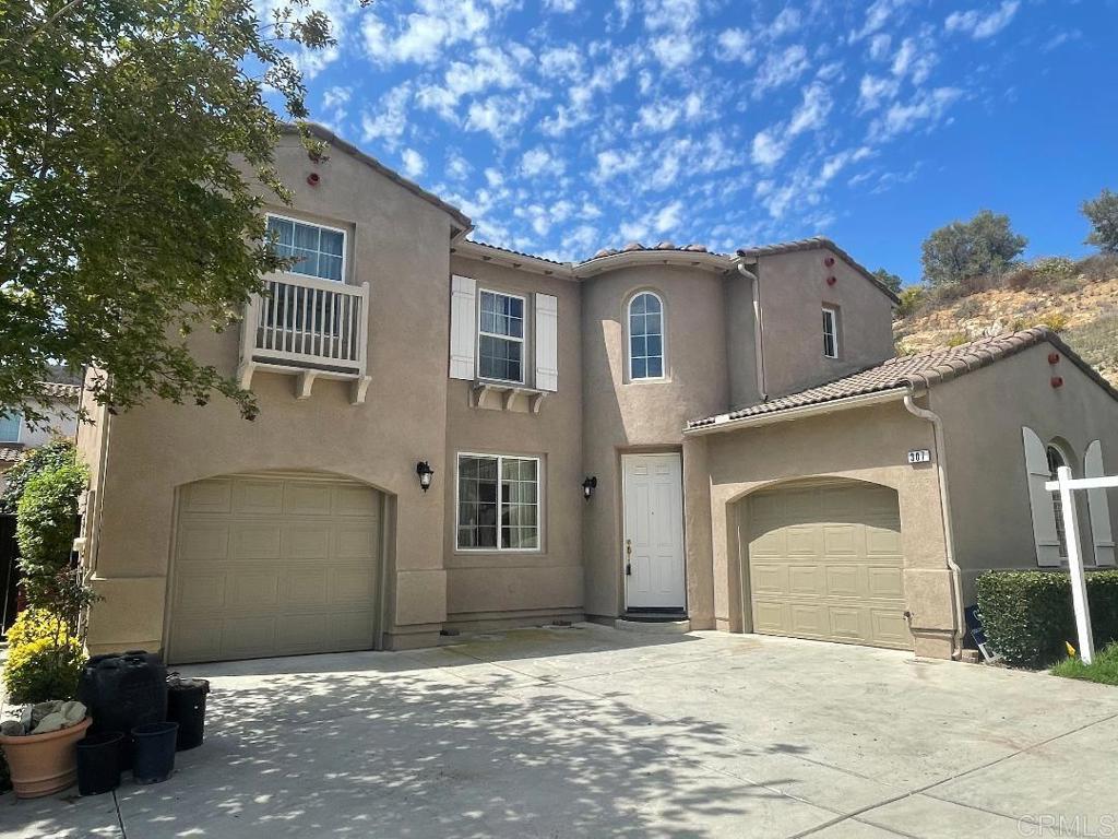 Extremely well maintained home tucked away at the end of short cul-de-sac. Located in the beautiful gated Belleza development close to San Diego State San Marcos. Home has large low maintenance yard with Trex patio, built-in BBQ with seating, plus large detached wood gazebo with metal roof. Landscape has beautiful healthy fruit trees, vegie garden and shed. Fully fenced yard kids & dogs. Interior has formal living & dining area plus family room with fireplace. Kitchen has newer stainless steel LG appliances, gas stove, frig and breakfast nook. Very open floor plan with lots of windows throughout & central air conditioning. Upstairs features three good sized bedrooms plus large loft, two baths, large laundry room with sink, cabinets and folding counter & washer and dryer are included. Primary suite has fireplace, large walk in closet & small balcony. Spacious master bath with double sinks, separate tub and shower & organized walk in closet. Two separate one car garages with electric openers & storage. Community has nice park with play structure. Slope & front yard are maintained by HOA.
