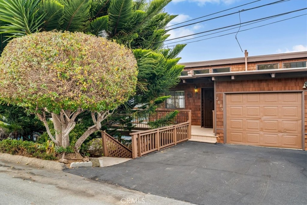 Enjoy spectacular whitewater ocean and rock views from both the main home and detached secondary unit of this property. Main house is two bedrooms and two bathrooms. The upstairs includes the kitchen, living room, and dining area, featuring decks and open beam ceilings. Two bedrooms and both bathrooms are located on the lower level, which also includes a large utility room.
The charming secondary unit is single level and one bedroom and one bathroom. The living room includes a cute dining nook and deck access. This is a very unique opportunity for 2 detached homes on a down slope lot with ocean views.