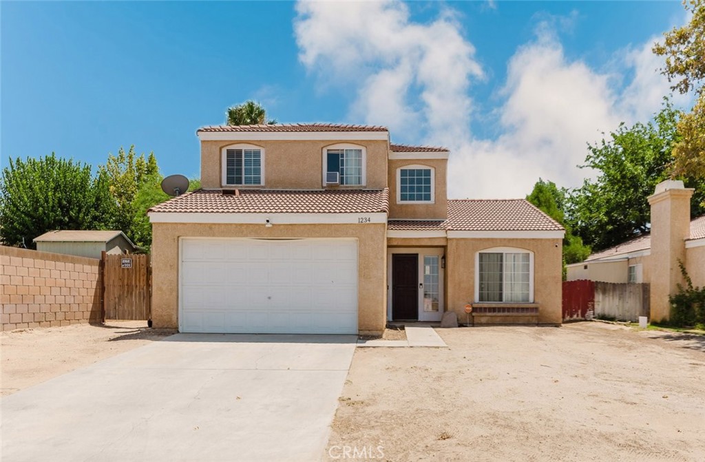 Welcome to 1234 E Kettering Street, Lancaster, CA - a beautifully updated single-family home offering comfort, style, and convenience. This spacious home features 4 bedrooms and 3 bathrooms, ideal for a variety of living needs. As you enter, you'll notice fresh cosmetic updates throughout the home, including an updated kitchen with modern countertops. The open and airy living spaces create a warm and inviting atmosphere perfect for relaxing or entertaining. Each bedroom is generously sized, offering flexibility for the entire family or a home office/guest space. Outside, the property offers a spacious yard, you can customize to whatever your heart desires. It's perfect for outdoor activities, gatherings, or simply enjoying the Southern California weather. Located in a central Lancaster neighborhood, this home is close to local schools, shopping centers, and dining. For commuters, not to far from the freeway makes getting around simple and efficient. This beautiful home is basically move-in ready and waiting for you to make it your own. Schedule a private showing today.