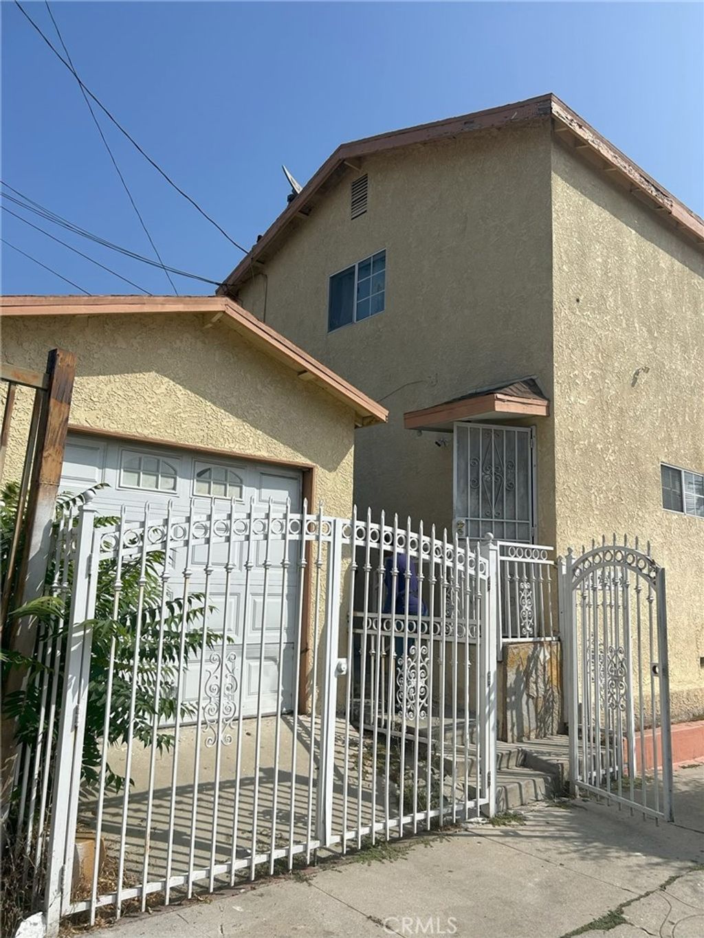 Photo of 451 E 111th Place, Los Angeles, CA 90061 (MLS # SR25208952)