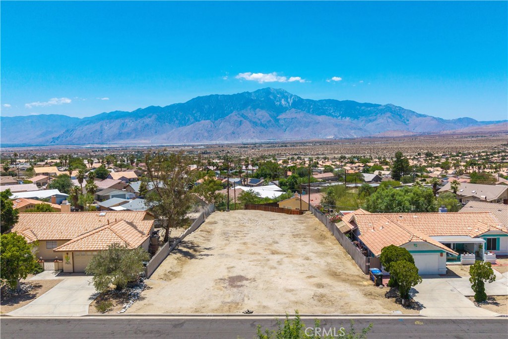 Build your vision on one of the largest lots in the neighborhood! This 0.31-acre parcel has a paid and installed water meter! It offers a rare opportunity in a well-established area of Desert Hot Springs, surrounded by existing homes. Whether you're looking to create your own custom residence or develop for resale, this spacious lot provides the canvas. Utilities appear to be nearby, and with its size and location, the property offers great potential for investment or long-term living. Don’t miss your chance to secure a prime piece of land in a growing community.