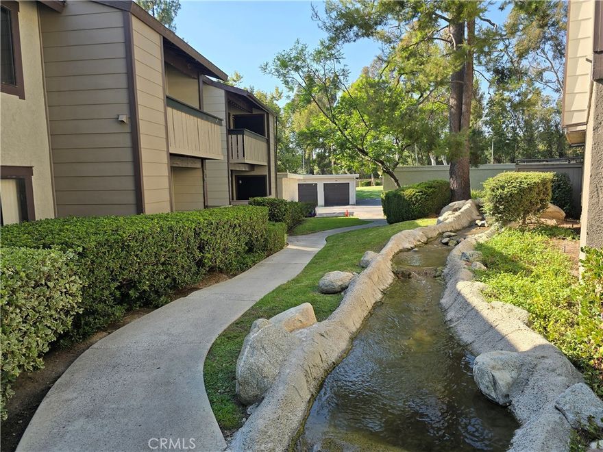 Welcome to Your Dream Home. Beautifully updated from top to bottom and move-in ready! Perfectly situated in a prime location, this condo harmoniously blends modern sophistication with tranquil surroundings to offer an exceptional lifestyle. Enjoy an expanded layout designed for optimal storage and counter space, featuring sleek cabinetry, premium countertops, and stainless steel appliances. The kitchen flows effortlessly into a spacious living area ideal for both entertaining and everyday relaxation with a brand new AC/Heating wall unit. Warm wood-style flooring, recessed lighting, and designer paint create a cohesive and inviting ambiance throughout the home. Step onto your private balcony with peaceful views perfect for unwinding after a long day at work. A discreet laundry closet is conveniently tucked away on the balcony for added functionality. The spacious master bedroom offers calming creek views and the soothing sounds of nature. A generous walk-in closet accommodates all your wardrobe needs, while the spa-inspired bathroom features a modern vanity, tub, and shower. Monthly HOA dues include water, sewer, trash, and exterior maintenance, simplifying your lifestyle. Enjoy quick access to freeways and toll roads, top-rated schools, premier shopping, dining, and entertainment. Nearby walking and biking trails, LA Fitness, and Lake Forest Sports Park complete the picture. Don't miss this incredible opportunity to own a unit that truly has it all.