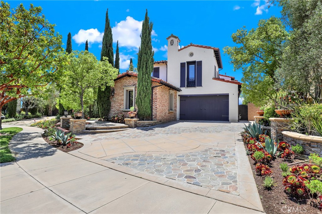 Step into your own slice of heaven in Newport Coast's prestigious, guard-gated Pacific Ridge community. This renovated gem boasts a spacious lot exceeding 9,000 square feet, all while offering breathtaking views of both the ocean and canyon. Notable enhancements range from newer plumbing, electrical systems, drywall, dual hvac, windows, to refined finishes and a indoor fireplace installed in 2023. The kitchen dazzles with its custom cabinets, double island setup, and even a wine cellar, while the bathrooms feature bespoke custom vanities. Spanning two floors, this residence includes five en-suite bedrooms and two versatile bonus rooms. Both lower-level rooms serve as ideal home office or entertainment space, while its upstairs primary room counterpart opens up to awe-inspiring ocean vistas. The expansive primary bedroom elevates the living experience with La Cantina bifolds that lead to a balcony, inviting in the soothing ocean breeze. The outdoor entertainment area is so alluring, you'll feel as if you've stumbled upon your personal paradise. Positioned just minutes from Fashion Island, world-class beaches, top-tier restaurants, and highly-rated schools, this home truly provides the quintessential Southern California lifestyle. Interior pictures of the home will be uploaded soon.
