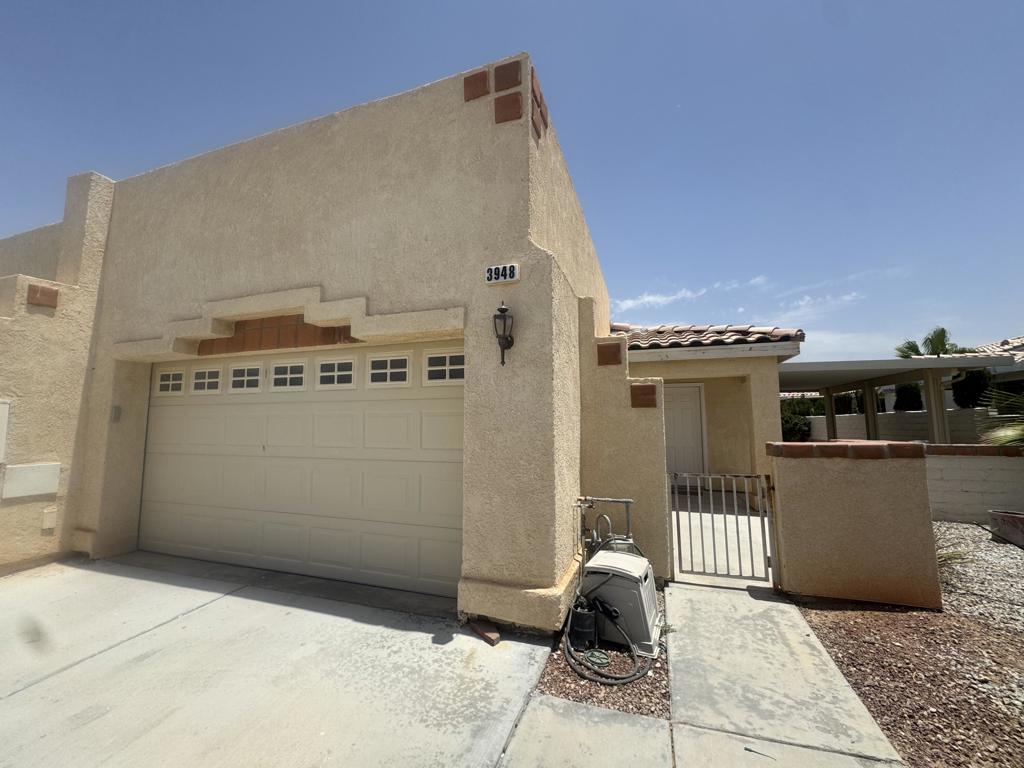 Tee off to a new lifestyle! This beautifully remodeled 2-bedroom, 2-bath villa is nestled on the Blythe Municipal Golf Course. Enjoy modern living with inside laundry, a finished 2-car garage, and a relaxing covered patio. Golf course living at its finest!