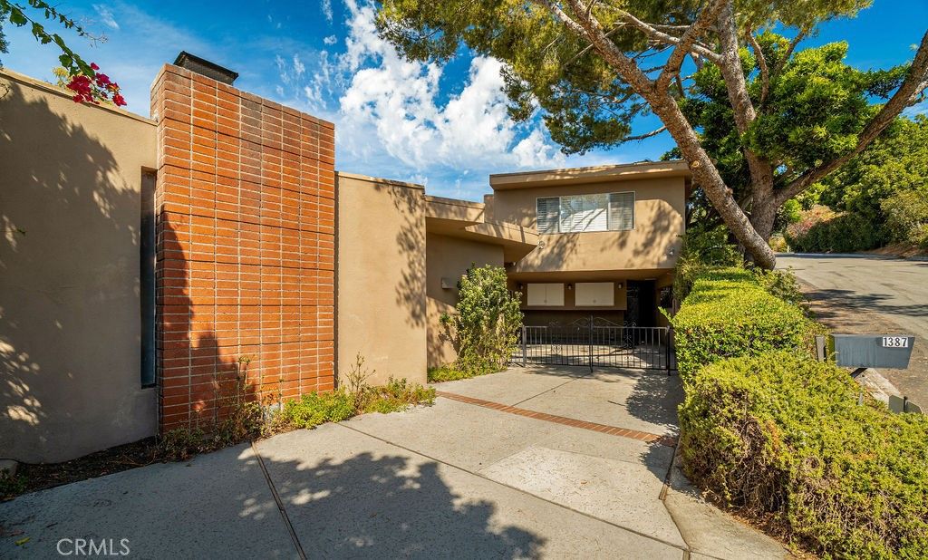 Photo of 1387 Casiano Rd, Los Angeles, CA 90049 (MLS # SB25225759)