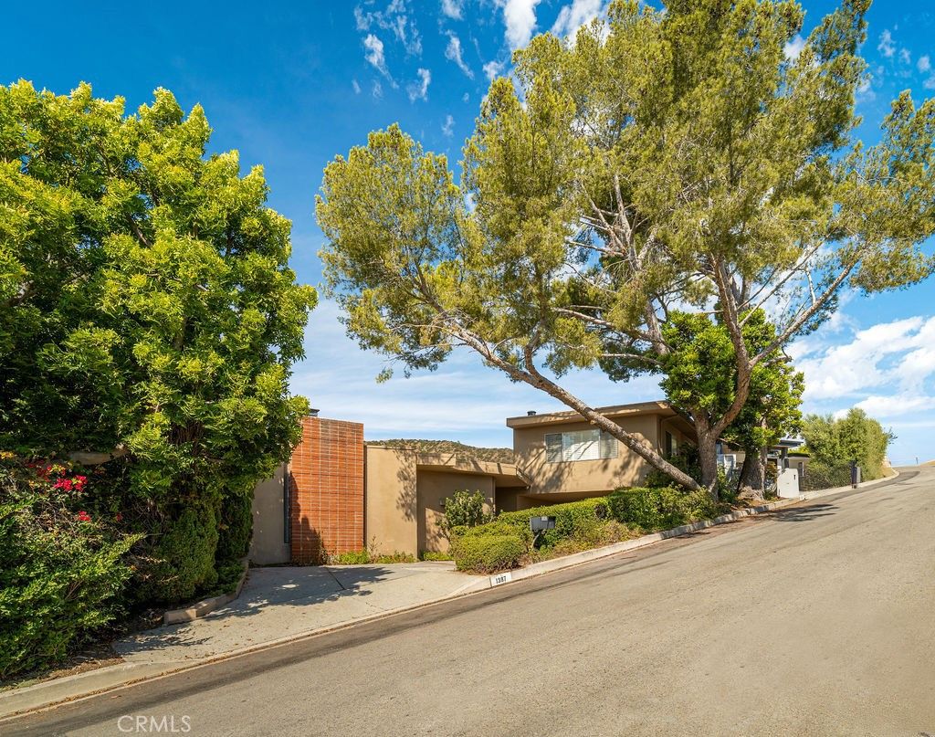 Photo of 1387 Casiano Rd, Los Angeles, CA 90049 (MLS # SB25225759)