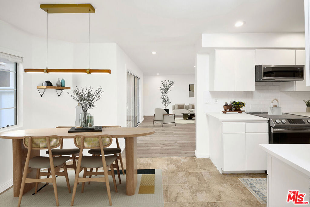 Welcome to this beautifully remodeled 3 bed, 2 bath condo ideally located just one block south of Wilshire. The versatile third bedroom is the perfect flex space - ideal for a home office, playroom, or home gym. Step into a spacious living room featuring a cozy gas fireplace, perfect for relaxing or entertaining. The newly renovated kitchen is equipped with stainless steel appliances and an electric stove, ready for all your culinary adventures. The primary suite includes a full en-suite bath, while the second full bath serves the additional bedrooms and guests. Additional highlights include in-unit washer and dryer, side-by-side parking, and extra storage rooms in the building. The community offers excellent amenities such as a gym, sauna and bike storage. Monthly HOA dues cover water, gas, and earthquake insurance for added peace of mind. All just 10 minutes from the beach with some of the Westside's best restaurants, bars, and shops, embrace the dream of Santa Monica coastal living!
