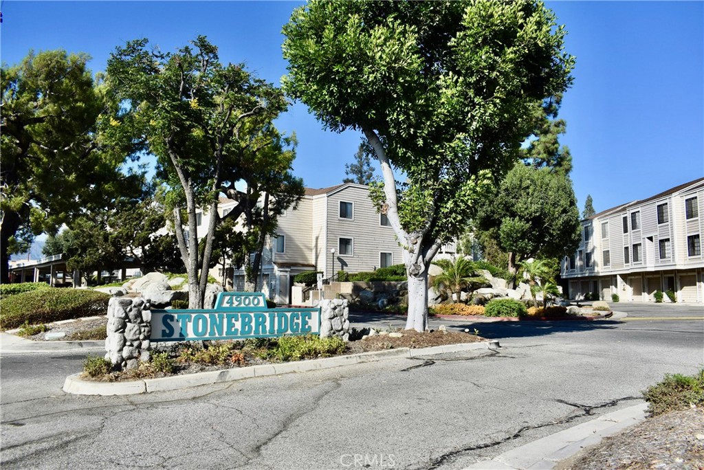 Welcome to this beautiful and charming condo located in the peaceful and highly sought-after Stonebridge Community in Covina. Offering about 1,000 sq ft of thoughtfully designed living space, this home perfectly blends comfort, function, and modern elegance — all nestled in a lush, serene setting with tranquil pond views and resort-style amenities. Discover a light-filled and open living and dining area featuring soaring vaulted ceilings, elegant laminate wood flooring, and a cozy fireplace — the perfect spot to unwind or entertain. Sliding glass doors lead to a private patio overlooking the community’s sparkling pools and mature trees creating a peaceful indoor-outdoor flow. The kitchen has been tastefully updated with granite countertops, stylish cabinetry, and quality appliances — a functional and stylish hub for cooking and gathering. The primary suite, a true retreat en-suite bathroom with a bonus closet and private balcony. Additional conveniences include an in-unit laundry area, high ceilings throughout, open floorpan and a bright sky light. Set in one of Covina’s most tranquil and well-kept communities, Stonebridge offers: Two sparkling swimming pools & a spa. Beautifully landscaped grounds with ponds and waterfalls. Ample guest parking. One-car garage, one assigned carport, and one designated space. Pet-friendly environment. HOA covers earthquake insurance, trash, and landscaping. Prime location close to the best that Covina and surrounding cities have to offer. Minutes from Kaiser Permanente, Emanate Health Queen of the Valley Hospital, local gyms, and wellness centers. Nearby Shopping & Dining to In-N-Out, Starbucks, and boutique eateries,IKEA, Eastland Shopping Center, and Covina Town Square. Explore the charming Downtown Covina Village filled with local shops, restaurants, breweries, and the Covina Center for the Performing Arts. Close proximity to parks, hiking trails, and golf courses including Covina Hills, South Hills Country Club, and Bonelli Park. Commuter-Friendly: Convenient access to 10, 210, and 57 freeways makes commuting a breeze whether you're heading to Pasadena, downtown Los Angeles, or the Inland Empire. The Covina Metrolink Station is just minutes away for stress-free travel into the city. Whether you're a first-time homebuyer, downsizing, or simply seeking low-maintenance living in a tranquil setting, this condo offers the perfect combination of modern upgrades, functional layout, and unbeatable location.