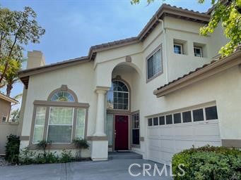 Nestled in the serene hills of Yorba Linda, this beautifully remodeled 3-bedroom with downstairs den residence offers tranquil living in the highly sought-after La Terraza community. Enjoy sweeping views and a thoughtfully upgraded interior featuring luxury vinyl plank flooring throughout—no carpet in sight. The desirable floor plan includes a versatile downstairs den and a full bath, ideal for guests or a home office. Dramatic soaring ceilings grace the fireside living room, creating an airy, open ambiance filled with natural light. Plantation shutters frame expansive windows, adding charm and privacy. The remodeled kitchen boasts quartz counters and a cozy breakfast nook, seamlessly connecting to the inviting family room and cozy backyard—perfect for everyday living and entertaining. Upstairs, the generous primary suite features renovated spa-like bathroom with a soaking tub, separate shower, and dual vanities. Two additional well-sized bedrooms share a full bath. The attached two-car garage offers ample built-in storage cabinetry to keep things organized. Enjoy community pool and tennis court. Walking distance to Bryant Ranch Elementary.
