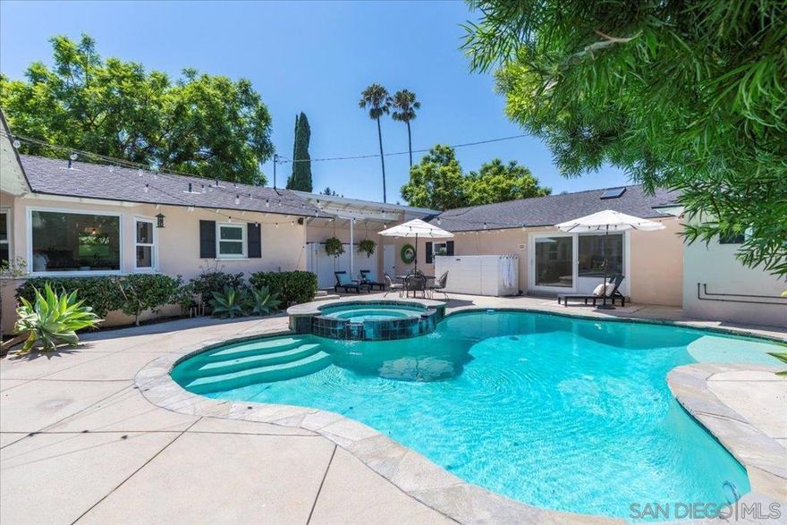 Discover exceptional value and timeless design in this custom 1950s Mid-Century home nestled in the heart of Morrison Park, one of Orange County’s most admired historic neighborhoods. With nearly 2,900 sq ft of living space, this residence offers more size, versatility, and upgrades than most homes in its class. Hardwood floors and light-filled living areas open to a private backyard retreat with pool, spa, and breezeway patio, creating an ideal setting for gatherings and relaxation. The remodeled kitchen blends classic charm with functionality—featuring stainless-steel appliances, granite counters, Carrera tile, breakfast nook, and butler’s pantry. The primary suite includes a spa-inspired ensuite with Italian marble floors and Steam Mist shower, while the detached poolside studio with kitchenette and bath provides flexible options for guests, home office, or rental. Surrounded by lush gardens and flagstone detailing, this is a rare opportunity to secure a spacious, upgraded home with enduring value in one of Santa Ana’s premier neighborhoods: the highly desirable Morrison Park —surrounded by architecturally significant custom homes, close to award-winning schools, three parks, and tennis courts, main place mall, choc hospital —this is a rare opportunity to own a completely remodeled Mid-Century Modern masterpiece that balances history, comfort, and luxury.