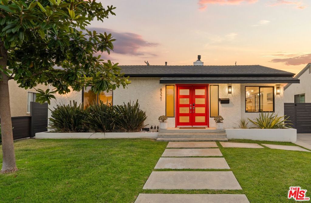 Discover the perfect blend of modern comfort and expansive outdoor living in this beautifully renovated smart home. With a fully enclosed front yard, a gated driveway with dual entries, and a lush backyard retreat, this property offers rare privacy and abundant space inside and out. Step through the gates into a dramatic double-door entry that opens to a light-filled great room. Designer wall coverings, custom lighting, and rich wood floors set a refined tone, while the open flow makes entertaining effortless. At the heart of the home, a wraparound chef's kitchen invites gathering with quartz countertops, sleek cabinetry, a breakfast counter, and premium appliances. The primary suite serves as a private sanctuary, complete with a spa-inspired bath featuring a freestanding soaking tub, walk-in shower, dual vanities, and a custom-built walk-in closet. Two additional bedrooms share a stylishly updated bath, ideal for family or guests. Outdoors, the home truly excels. The enclosed front yard provides curb appeal and security, while the backyard unfolds as a sun-drenched oasis with lush green lawn and multiple patios designed for entertaining, dining, or simply relaxing. Behind the detached garage, a versatile flex space offers endless potential as a studio, home office, or guest quarters. Upgrades deliver peace of mind, including newer plumbing, electrical, roof, windows, and HVAC. Smart home automation enhances everyday living with app-controlled lighting, climate, keyless entry, a Ring doorbell, Wi-Fi enabled automatic driveway gates, and a whole-home water filtration system. This is more than a home - it is a lifestyle. A rare opportunity to enjoy contemporary elegance, modern convenience, and exceptional outdoor living all in one.