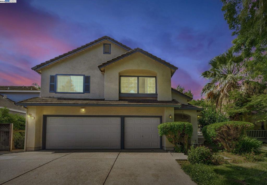 Light, bright, and newly refreshed in the heart of Tracy, this spacious 4BD/2.5BA two-story home (1,945 sq ft) sits on a generous 6,000+ sq ft lot. The interior has been fully painted, giving the home a fresh and inviting feel throughout. The rare three-car garage provides ample parking and storage space. The open and airy layout offers a welcoming living room with a cozy fireplace, a functional kitchen with plenty of cabinet space, and a dining area ideal for everyday meals or entertaining. Upstairs, you'll find four generously sized bedrooms, including a primary suite with a private en-suite bathroom. Energy-efficient leased solar helps keep utility bills low, and the large backyard with patio provides the perfect setting for relaxing or entertaining outdoors. With a lime tree out front and grapefruit and orange trees in the back, you’ll have the perfect setup for enjoying your own fresh-picked fruit right at home. This move-in-ready home offers the perfect blend of comfort and space in a well-established neighborhood. Conveniently located near schools, parks, shopping, and dining.
