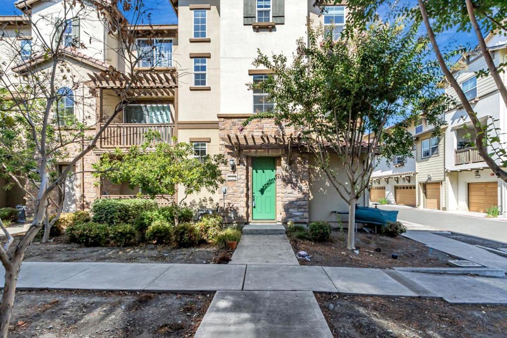 Wonderful End-Unit Townhome-Style Condo with Abundant Natural Light and Peaceful Greenbelt Views! This well-maintained 11-year-young home features a spacious primary suite, a modern open-concept kitchen with sleek stainless steel appliances, recently upgraded flooring throughout, an extra-large side-by-side two-car garage and an extended covered patio. The HOA offers exceptional amenities with a very low HOA fee, including plentiful guest parking, two playgrounds, a clubhouse, bocce ball court, BBQ and picnic areas, a dog park, and a community garden. Perfectly situated with easy access to Highways 101 & 680, BART, and VTA stations. Nearby shopping options include Costco, H-Mart, Ranch 99, Safeway, and more. The home is also in close proximity to major tech employers such as Cisco, Nvidia, Broadcom, and others. The neighborhood elementary school is rated 8/10 by GreatSchools. This cherished home has been filled with love, laughter, and good fortune by its current owners - and now its ready for you. Don't miss this incredible opportunity!
