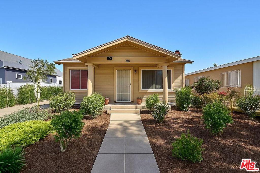 Fantastic opportunity to own an income-generating duplex in vibrant Jefferson Park! This well-cared-for property features two spacious units with original charm and thoughtful updates. The front unit (2BD/1BA, approx. 1,167 sq ft) is currently tenant-occupied, offering immediate rental income. The rear unit (4BD/2BA, approx. 1,440 sq ft) will be delivered vacant, perfect for owner-occupants or setting a market rent. Each unit has its private entrance. The front unit includes in-house laundry hookups, while the rear unit has laundry hookups in the garage preexisting prior to current ownership. A deep lot, long driveway, and detached garage (ADU potential buyer to verify) add value and flexibility. Ideally located near USC, Downtown LA, Culver City, the Expo Line, and West Adams' dining scene, this property offers convenience, upside, and classic LA character. Some photos may be virtually enhanced or staged.