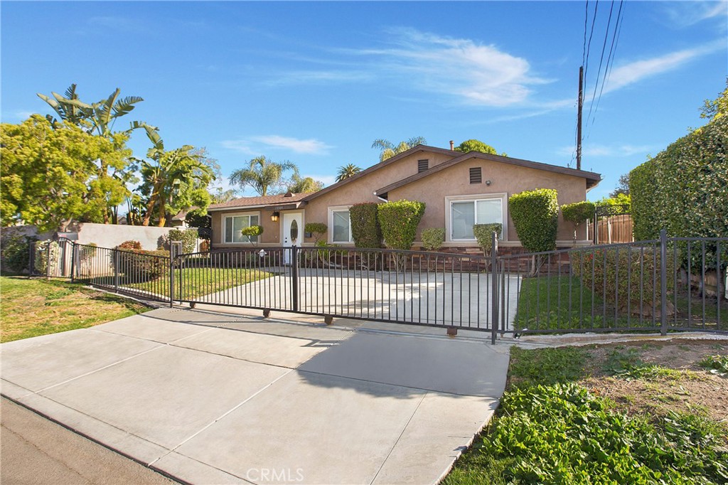 Charming 3-Bed, 2-Bath Home in Desirable Whittier Neighborhood! Welcome to this beautifully maintained single-story home offering 1,474 sq ft of comfortable living space. Featuring an open floor plan, the heart of the home boasts stunning quartz countertops, a stainless steel range, and a spacious breakfast bar—perfect for everyday living and entertaining. Enjoy porcelain tile flooring throughout the main areas and plush carpet in the generously sized bedrooms. The expansive backyard offers endless possibilities, and the detached two-car garage, along with a gated front driveway, provides ample parking. Conveniently located near the 605 Freeway and just minutes from vibrant downtown Whittier, where you'll find great shopping, dining, and more. Don’t miss this opportunity—schedule a tour today!