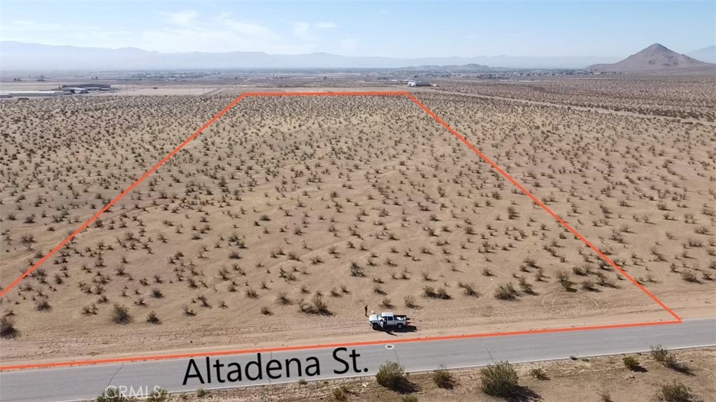 This ±15AC parcel zoned for Specific Plan Industrial in North Apple Valley is a must have. This parcel comes complete with existing water and sewer on Altadena St. (Buyer to Verify). This investors' dream is located right in the center of multiple recent land sales and BIG investor properties. Sitting close to the Apple Valley Airport, multiple big box stores, distribution centers, and most importantly, the Brightline West High Speed Rail project; this land holds limitless potential! Act fast to get in on all the action in this highly desirable and quickly developing part of the Southern California High Desert!