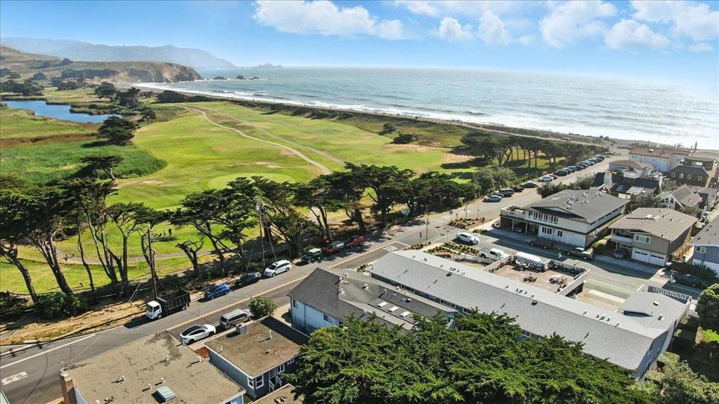 Nestled in the beautiful city of Pacifica, this charming beach side bungalow offers comfortable updated living spaces with fresh interior & exterior paint. Featuring 2 bedrooms and 1 full bathroom, it is perfect for a cozy lifestyle. The updated bathroom includes a solid surface stall glass enclosed shower, adding a contemporary touch. The updated kitchen is designed with an eat-in setup & stainless appliances that seamlessly connects to the dining area, making it ideal for casual meals or entertaining guests. Enjoy the warmth and ambiance provided by the living room fireplace, perfect for relaxing evenings. Practical amenities include an efficient garage laundry setup, making household chores convenient. This property is situated on a 4,838 sq ft fenced lot, offering space for outdoor activities. Located directly across from Sharp Park Golf Course and Beach, with trails, picnic areas, and ocean views just steps away and within the Pacifica Elementary School District, families will appreciate the proximity to educational institutions. Don't miss this opportunity to own a delightful home in Pacifica!