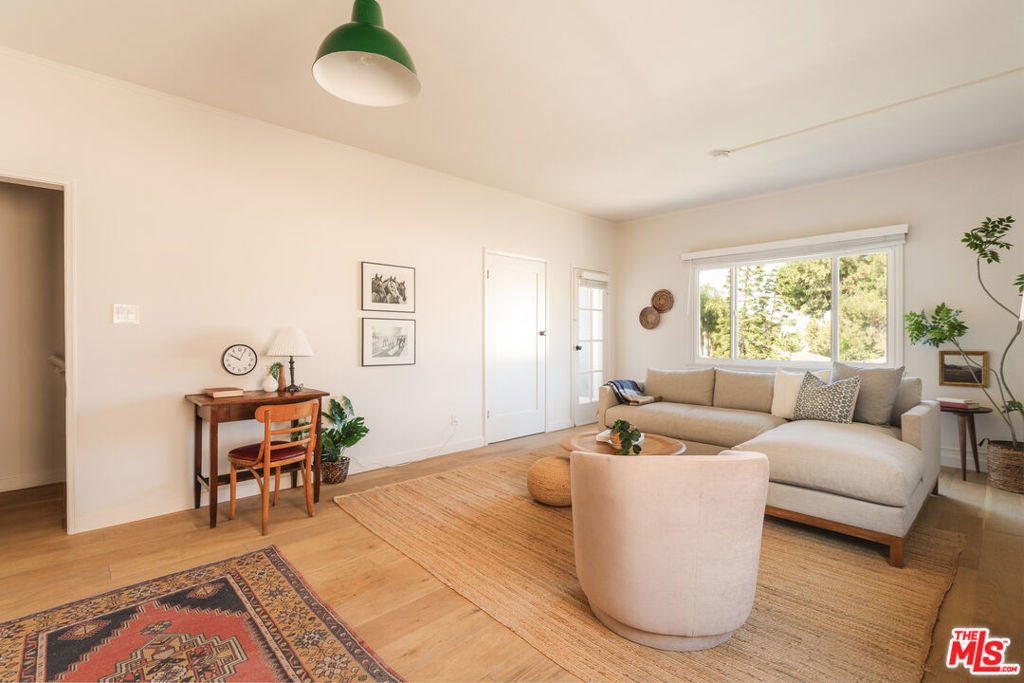 Photo of 1224 1/2 N Hoover Street, Los Angeles, CA 90029 (MLS # 26869441)