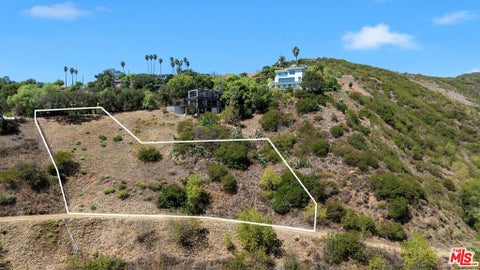 Photo of 26557 Ocean View Dr DR, Malibu, CA 90265 (MLS # 26992819)