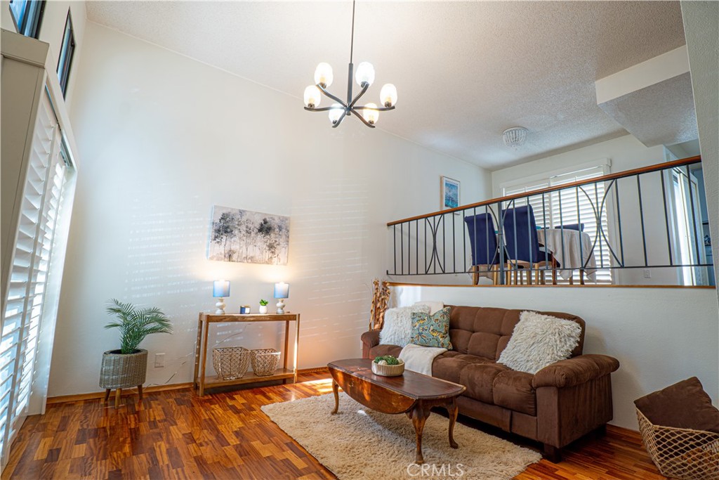 Nestled among mature trees in the desirable North Hills community, this exceptional multi-level townhome offers the perfect blend of sophistication, comfort, and convenience.
Boasting two spacious bedrooms and 2.5 well-appointed bathrooms, this light-filled residence features soaring ceilings and a bright, open floor plan that seamlessly connects the living, dining, and kitchen areas—ideal for both everyday living and effortless entertaining.
Step outside to a private balcony off the dining room and kitchen, perfectly suited for al fresco dining or morning coffee surrounded by nature.
Upstairs, each bedroom enjoys its own private en-suite bathroom with a walk-in shower, as well as ample closet space for optimal organization.
The attached garage includes laundry facilities for added convenience, plus additional storage under the stairs and in a dedicated storage room.
Offering a rare combination of style, space, and function, this townhome is a true North Hills gem.