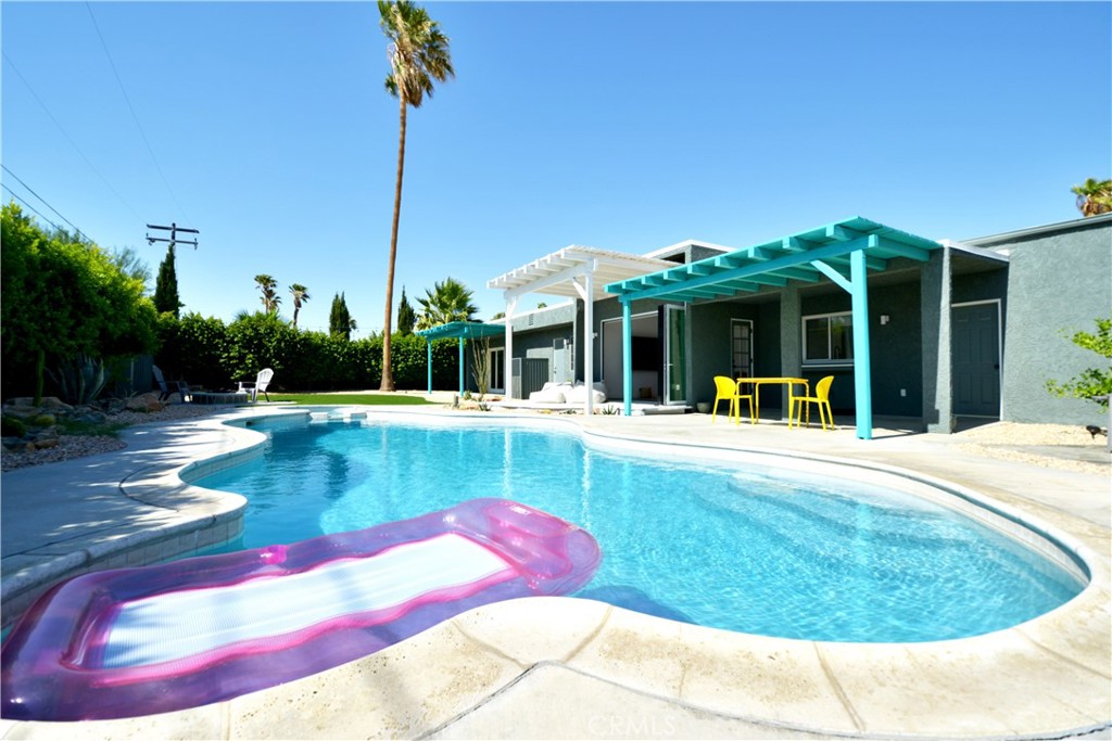 Resort Style furnished home. Imagine Living like its a vacation in a full time 12 month rental!!
Perfect Mid Century Renovated and designed Fully Furnished Vacation Home in Desirable Desert Park Estates. Backyard Paradise Professionally designed and executed landscape with full privacy Ficus, cactus rock and artificial grass. Home has been host to private Weddings and many family vacations. Fully lit front and back Led landscape lights. Beautiful custom pool and Spa with full automation of all controls. The inside is perfection designed and executed to maximize a minimalist modern style with a seamless transition to outdoor living. Complete Wall of Doors 9 x 12 opens seamlessly to make the living room and pool/deck area one complete space. The living room opens to an unobstructed view of the San Jacinto Mountains with privacy hedges for a completely private back yard. Large bedrooms and beautiful custom solid surface floors.