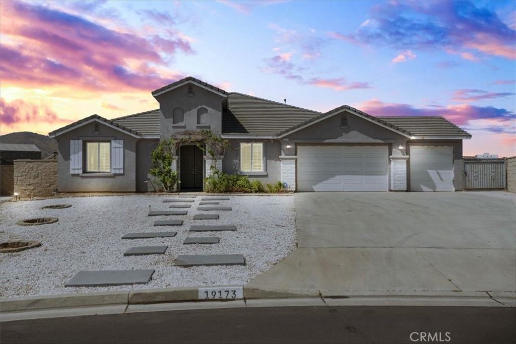**Great Value Opportunity!** This beautifully remodeled single-story home in the desirable **Boulder Springs** neighborhood is situated on a flat, usable **.84-acre lot**, perfect for adding a pool, spa, horse facilities, or an ADU. The home features a spacious, open floor plan with a large living and dining area, along with a stunning remodeled kitchen complete with an island, **quartz countertops**, and **brand-new appliances**. The kitchen flows seamlessly into the inviting family room, highlighted by a cozy fireplace and a media niche.
The private primary suite offers a luxurious en suite bath with a soaking tub, separate shower, dual vanities, and a walk-in closet. There are three additional bedrooms, a full guest bath, and a convenient laundry room with direct garage access.
Additional upgrades include **fresh interior paint**, a covered patio ideal for outdoor entertaining, a storage unit, and even a greenhouse. All of this is located in a rapidly expanding area near **March Air Reserve Base**, major employment centers, and commuter routes — offering both convenience and future growth potential.
**Don’t miss this incredible value — a rare combination of land, location, and upgrades!**