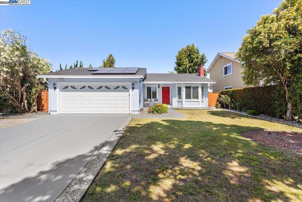 Welcome to this Outstanding Ranch-Style Home with “Permitted” Sunroom & "Paid" Solar in Fremont’s sought-after Northgate neighborhood, where comfort, flexibility, and thoughtful updates come together. This beautifully maintained 3-bedroom, 2-bath residence offers 1,451 sq. ft. of interior living space, plus a fully permitted 362 sq. ft. sunroom, not included in the official sq footage, providing valuable bonus space for a second living area or entertainment room. Set on a generous 6,585 sq. ft. lot, the home is just minutes from top-rated Warwick Elementary, scenic parks, walking trails, shopping, and major commuter routes. Inside, you’re welcomed by a vaulted-ceiling living room with a wood-burning fireplace, and an open-concept kitchen featuring granite countertops, a central island, and appliances, perfect for modern living and entertaining. Large windows bathe the space in natural light, while hardwood and tile flooring, dual-pane windows, and central A/C add comfort and style throughout. Step outside to a private backyard with a pergola, ideal for weekend barbecues, relaxing evenings, or gardening. With an attached 2-car garage and a functional single-level layout, this home offers a perfect blend of practicality and charm in one of Fremont’s most established communities.